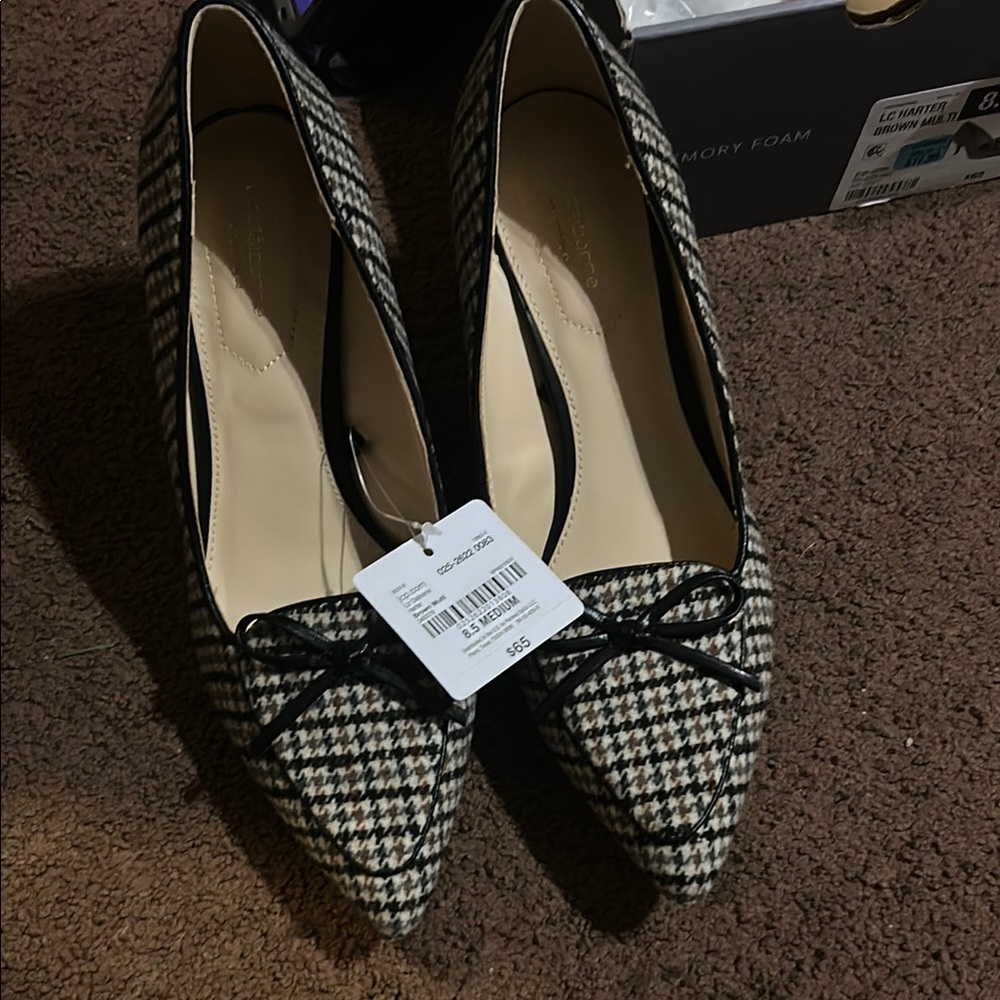 Anne Klein Black and White Flats with Textured Design